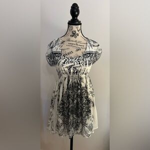 Colori Black and White Patterned Long Empire Waist Top.